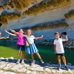 조지아 국제학교와 교육 환경 - **Prompt:** A vibrant and diverse group of children, aged 8-14, dressed in comfortable, modest casua...